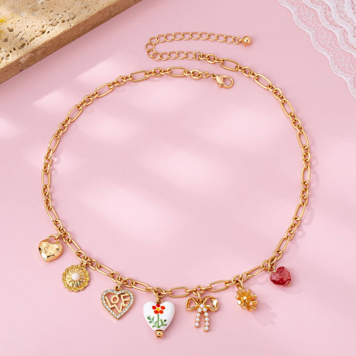 Gold Figaro Chain Multi-Charm Statement Necklace | 80N92748