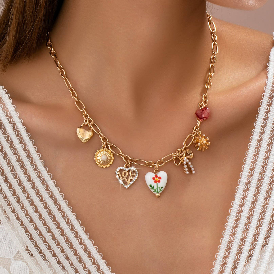 Gold Figaro Chain Multi-Charm Statement Necklace | 80N92748