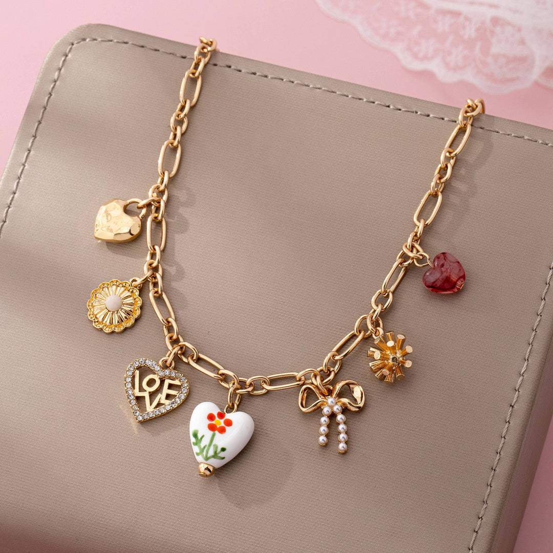 Gold Figaro Chain Multi-Charm Statement Necklace | 80N92748